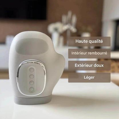 Handrelax électrique utilisé pour soulager les douleurs articulaires des mains. Appareil avec fonction chauffante et vibrations, idéal pour les personnes souffrant d'arthrose ou de syndrome du canal carpien.